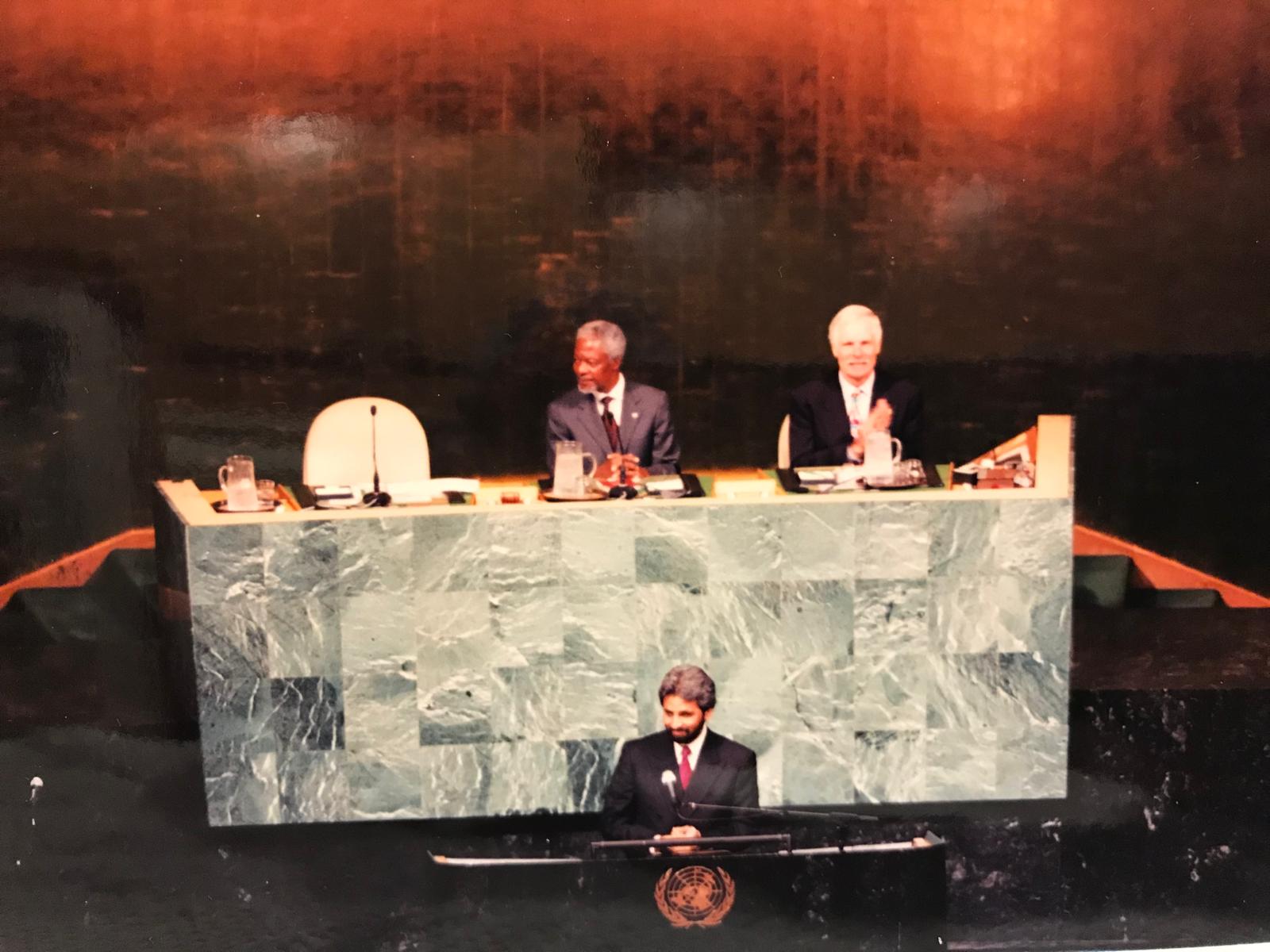 H.E. Bawa Jain addressing the United Nations General Assembly Hall as UN Secretary-General Kofi Annan and Ted Turner look on, 2000